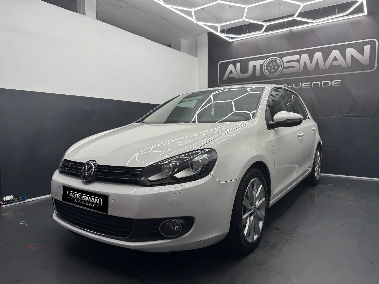 VOLKSWAGEN Golf 1.6 TDI DPF Sport 2011 Diésel Blanco - Vista lateral